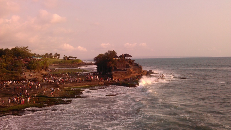 Crowds at a temple popular with tourists in Bali Crowds at a temple popular with tourists in Bali